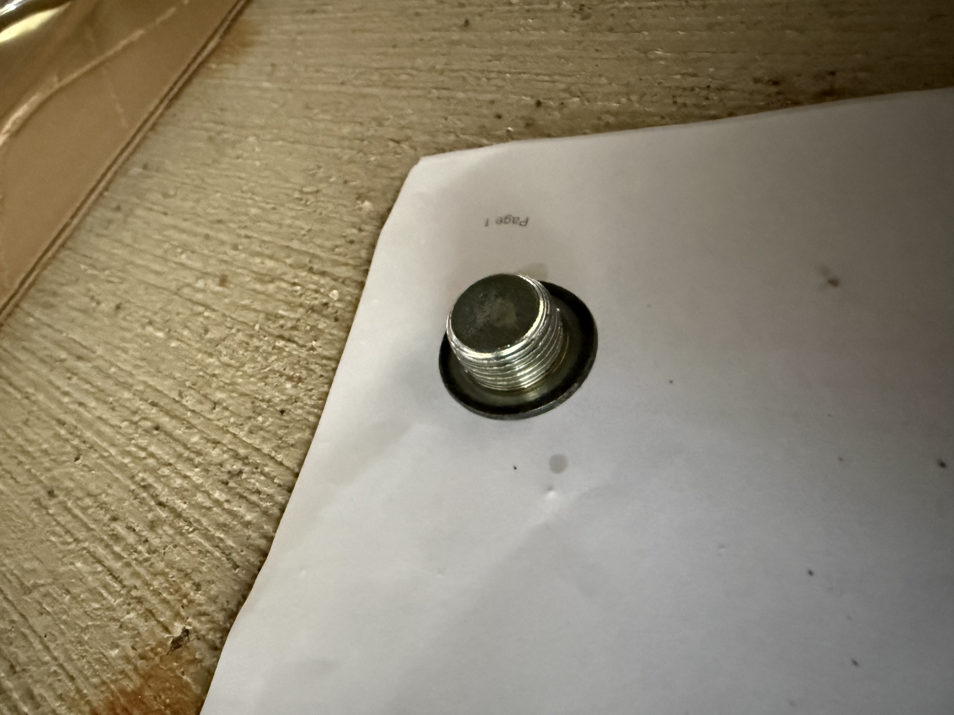 Drain plug with the new crush washer installed