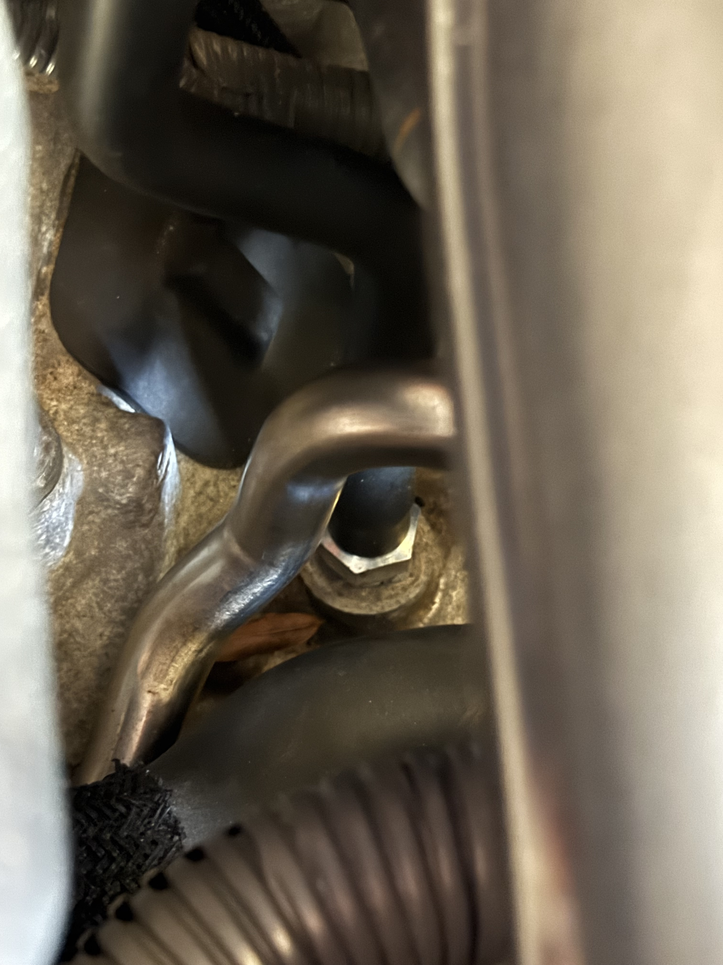 Hose running from throttle body to PCV valve